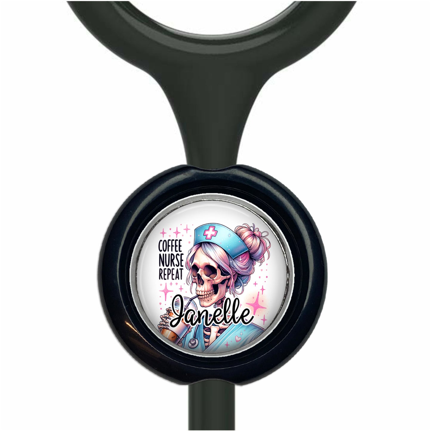 A black stethoscope with a round, personalized nameplate attached to it. The nameplate features a cartoon image of a skeleton wearing a nurse's hat and the text "Coffee Nurse Repeat".