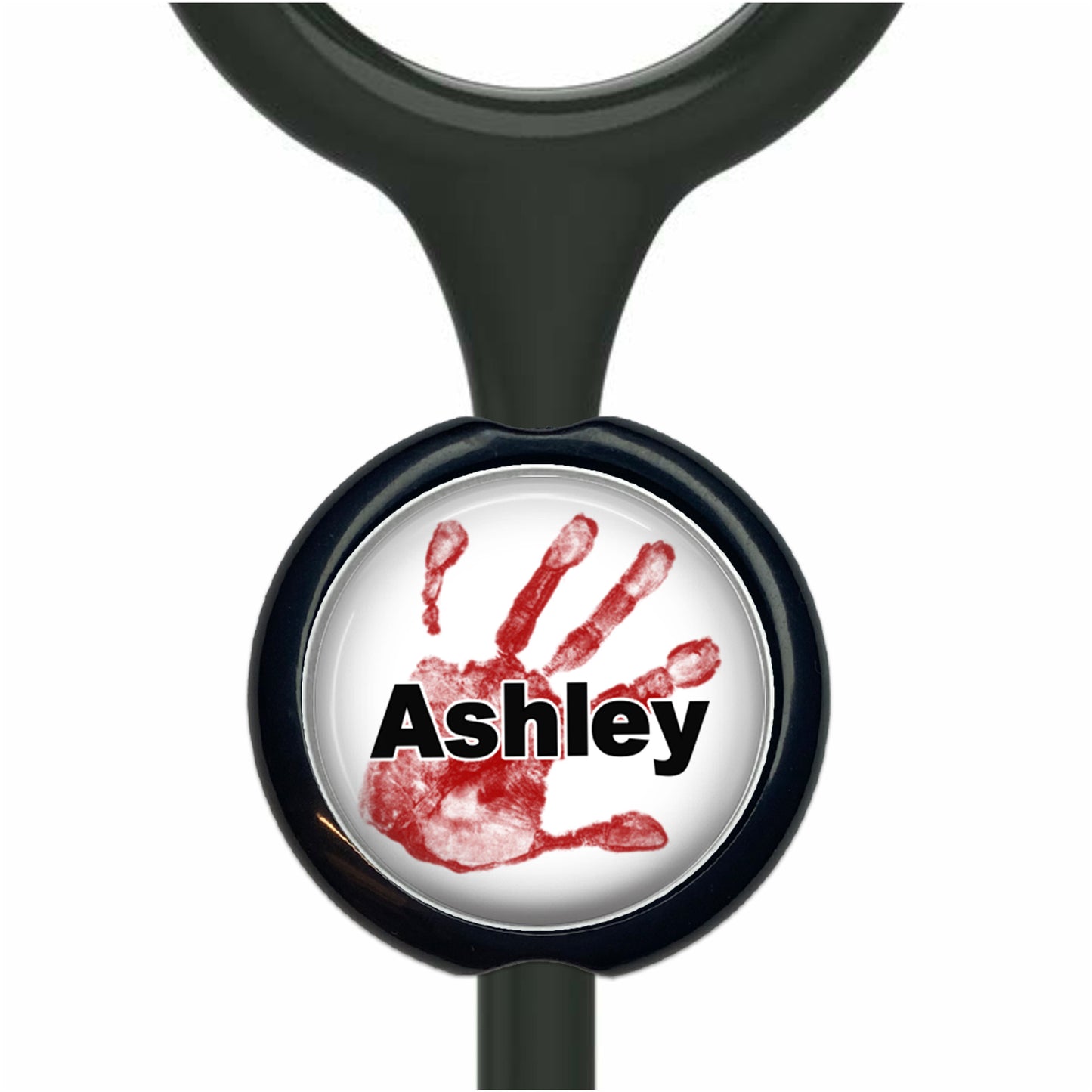 A black stethoscope with a round black and white handprint design featuring the name "Ashley" in black text.
