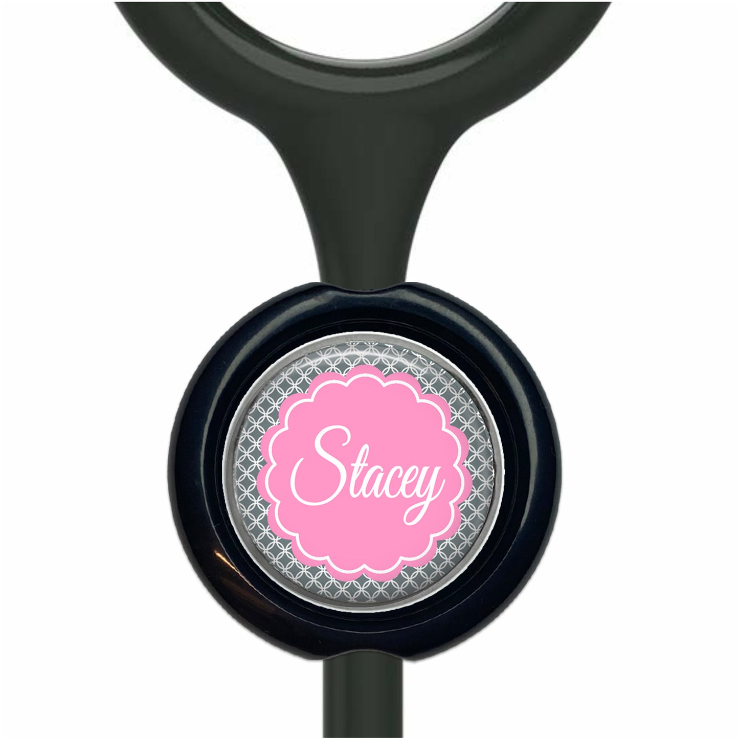 A black stethoscope with a personalized nameplate attached to it.