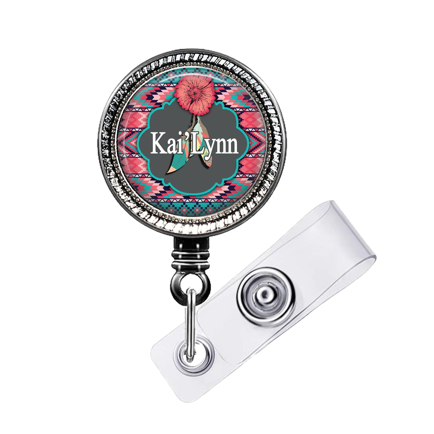 A round badge holder with a colorful floral design and the name "Kai Lynn" printed on it.