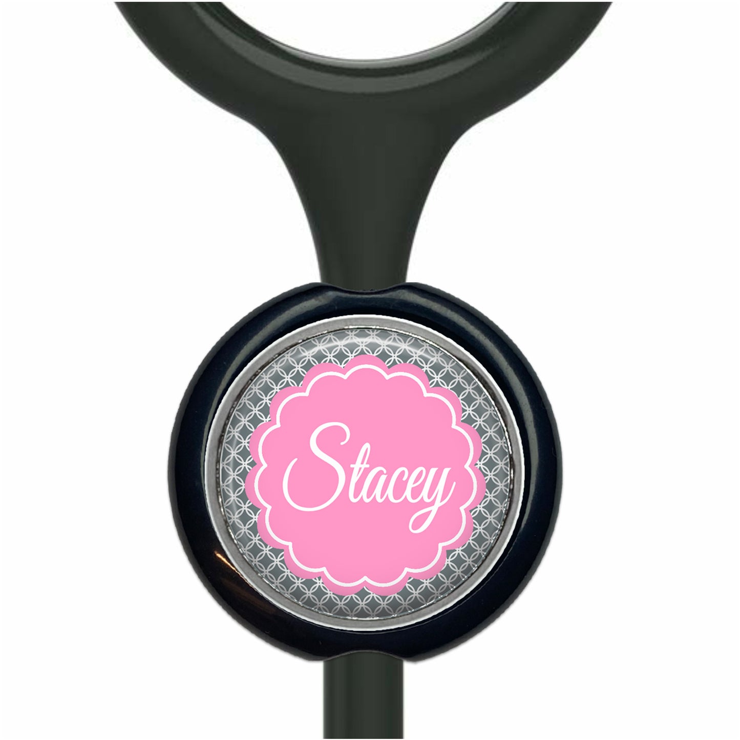 A black stethoscope with a personalized nameplate attached to it.
