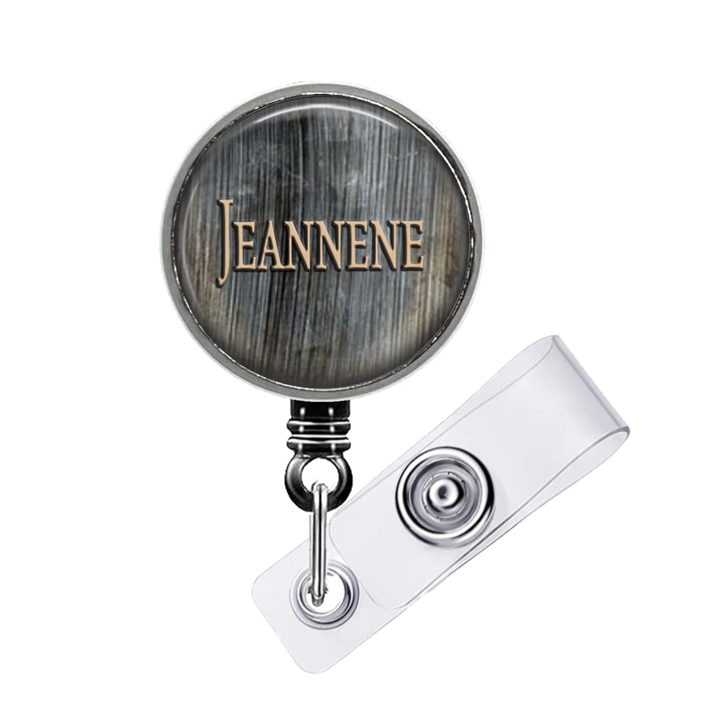 A round badge holder with the name "Jeanne" printed on it.