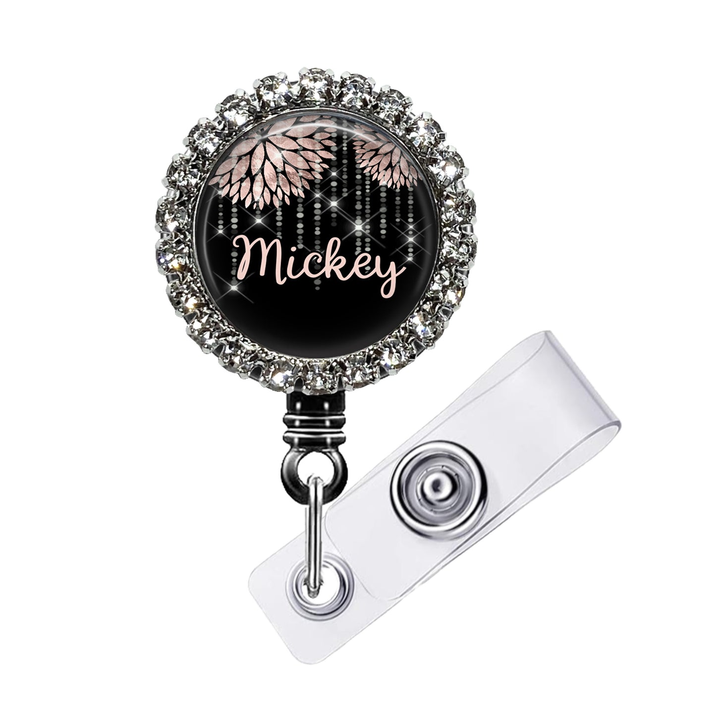 A black and silver badge holder with a personalized name tag attached to it.