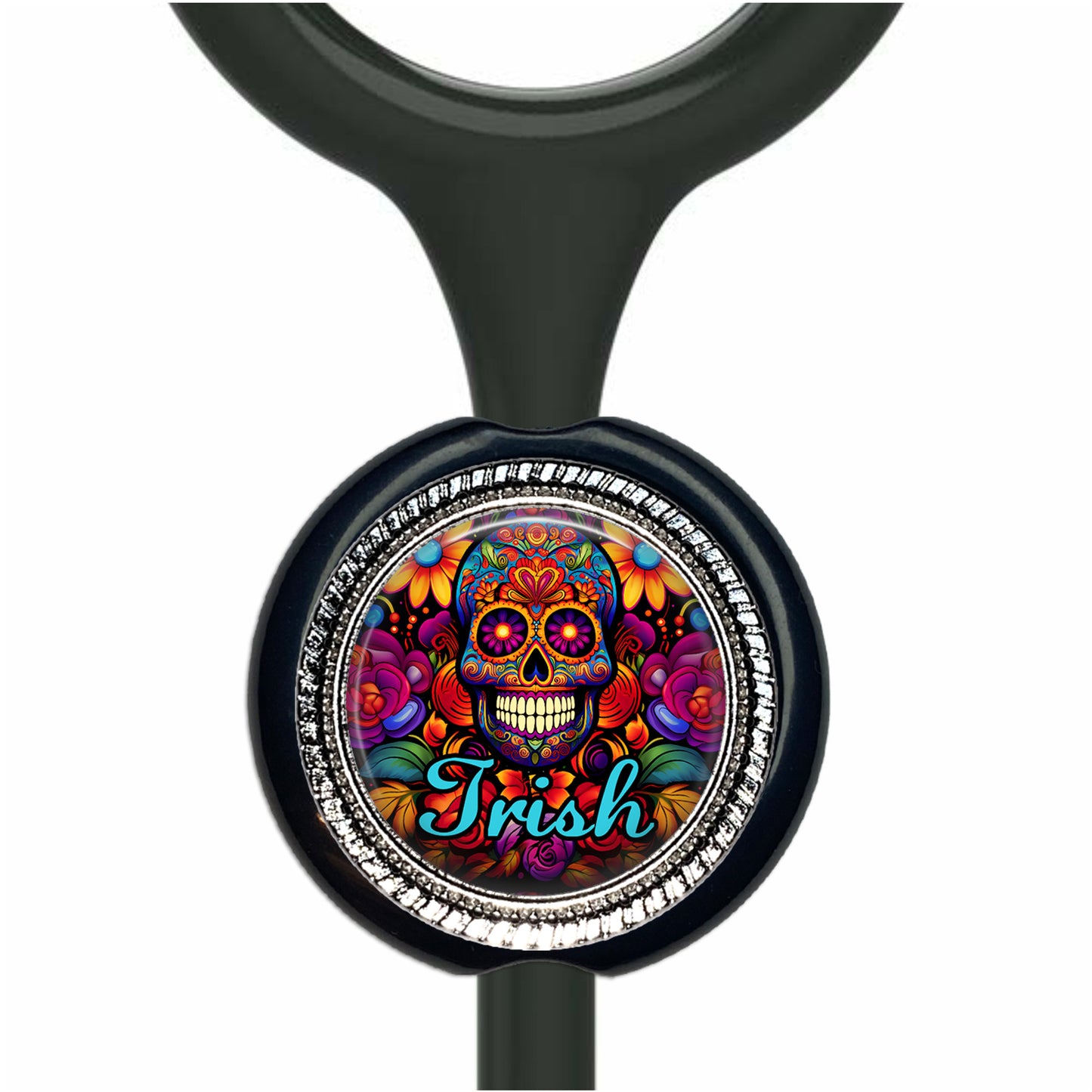 A black stethoscope with a circular charm featuring a colorful, intricate design of a skull surrounded by flowers and the word "Irish" written on it.