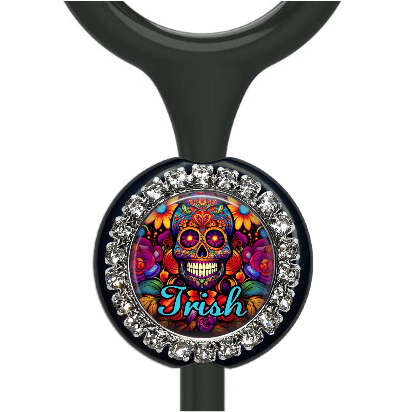 A colorful, decorative charm featuring a skull design surrounded by flowers and other vibrant elements.