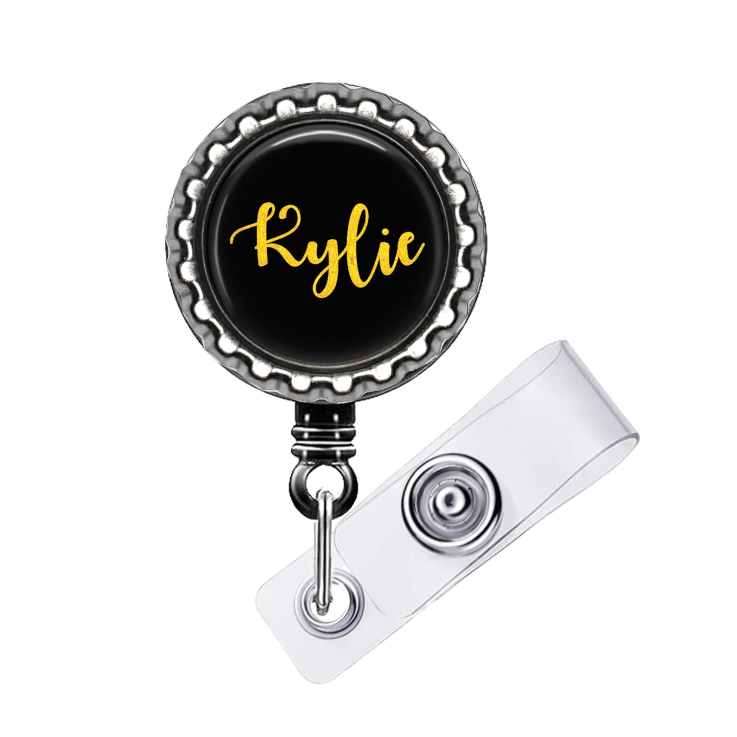 A black badge with a personalized name tag attached to it.