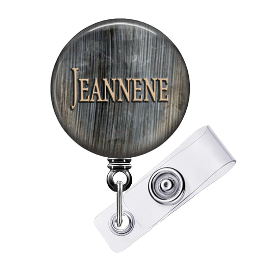 a badge with the name jeanine on it