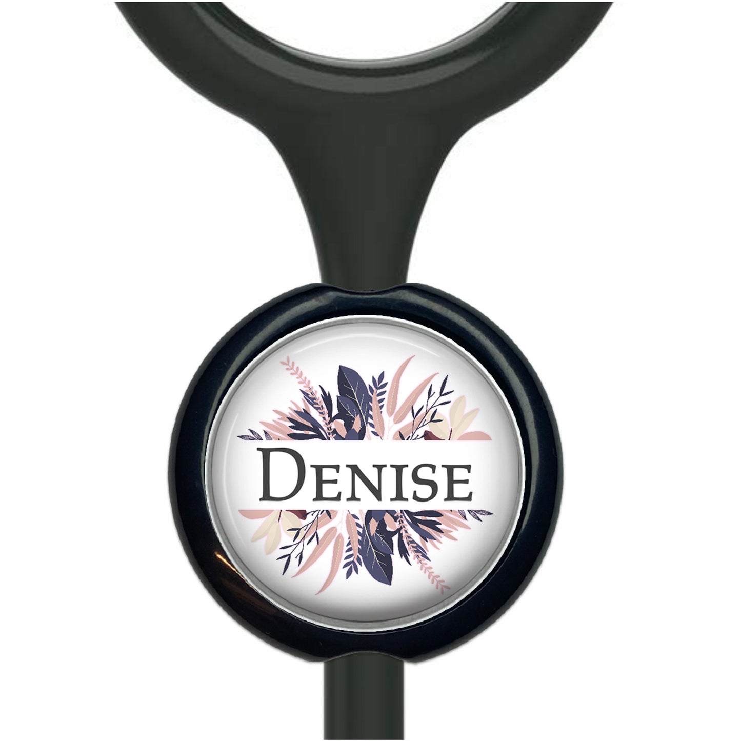 A black stethoscope with a round, personalized name tag attached to it.
