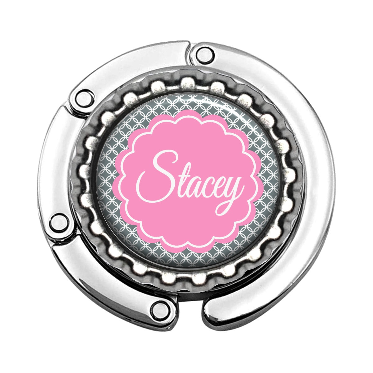 a metal object with a pink flower on it