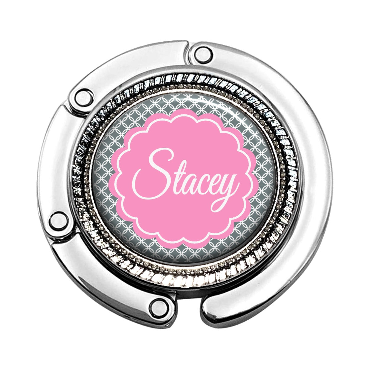 a round metal object with a name on it