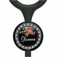A black stethoscope with a personalized nameplate featuring a floral design and the name "Shannon".