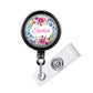 A personalized name badge with a floral design and the name "Sophia" printed on it.