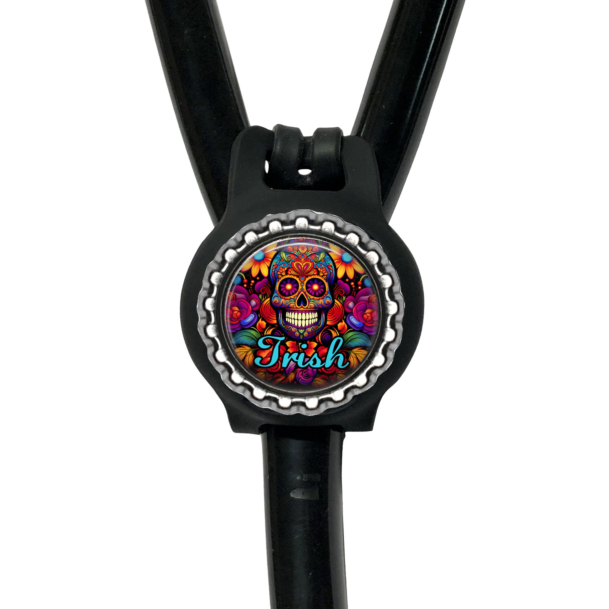 A black stethoscope with a colorful, circular charm featuring a skull design and the word "Irish" written on it.
