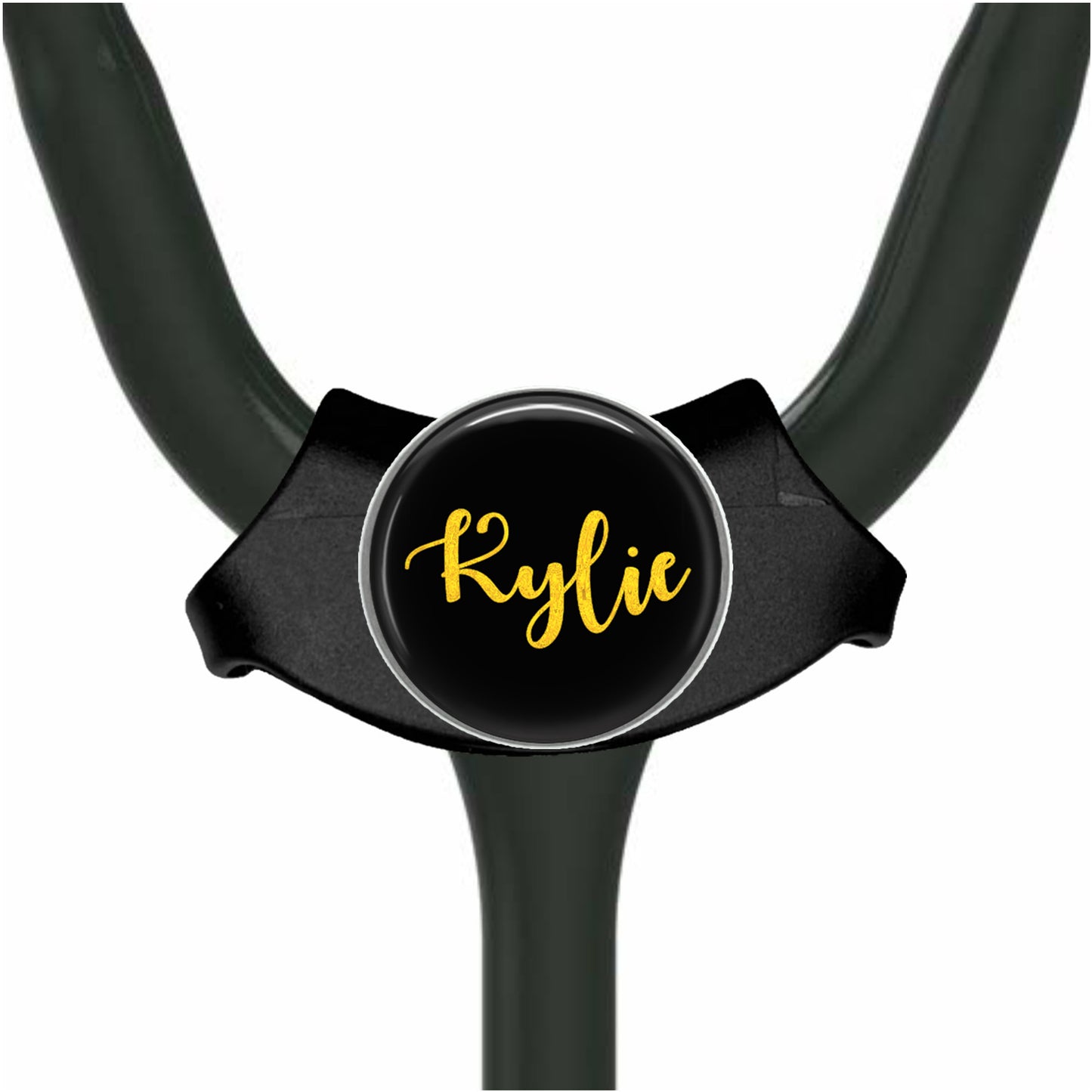 A black stethoscope with a personalized name badge attached to it.