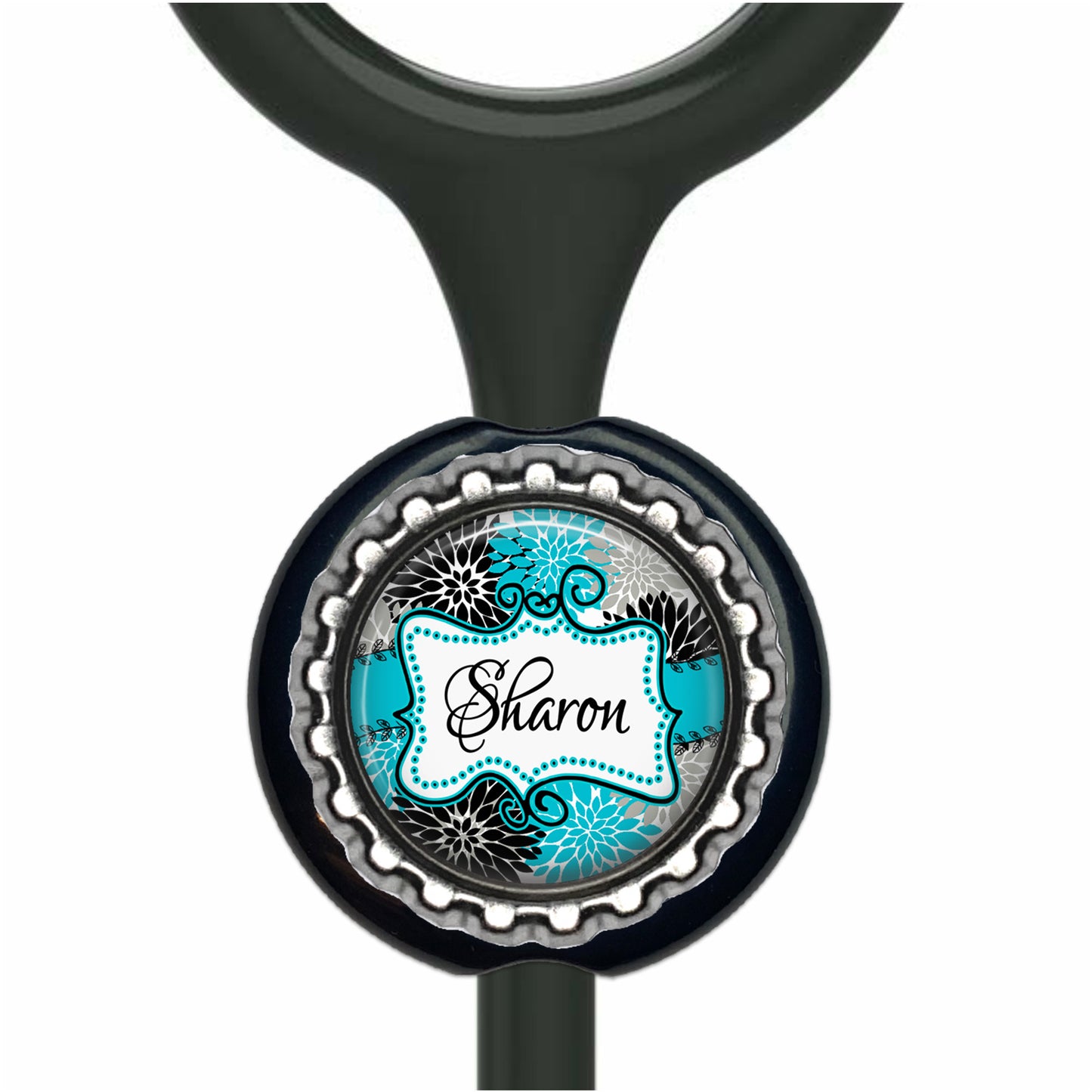A black stethoscope with a personalized nameplate attached to it.