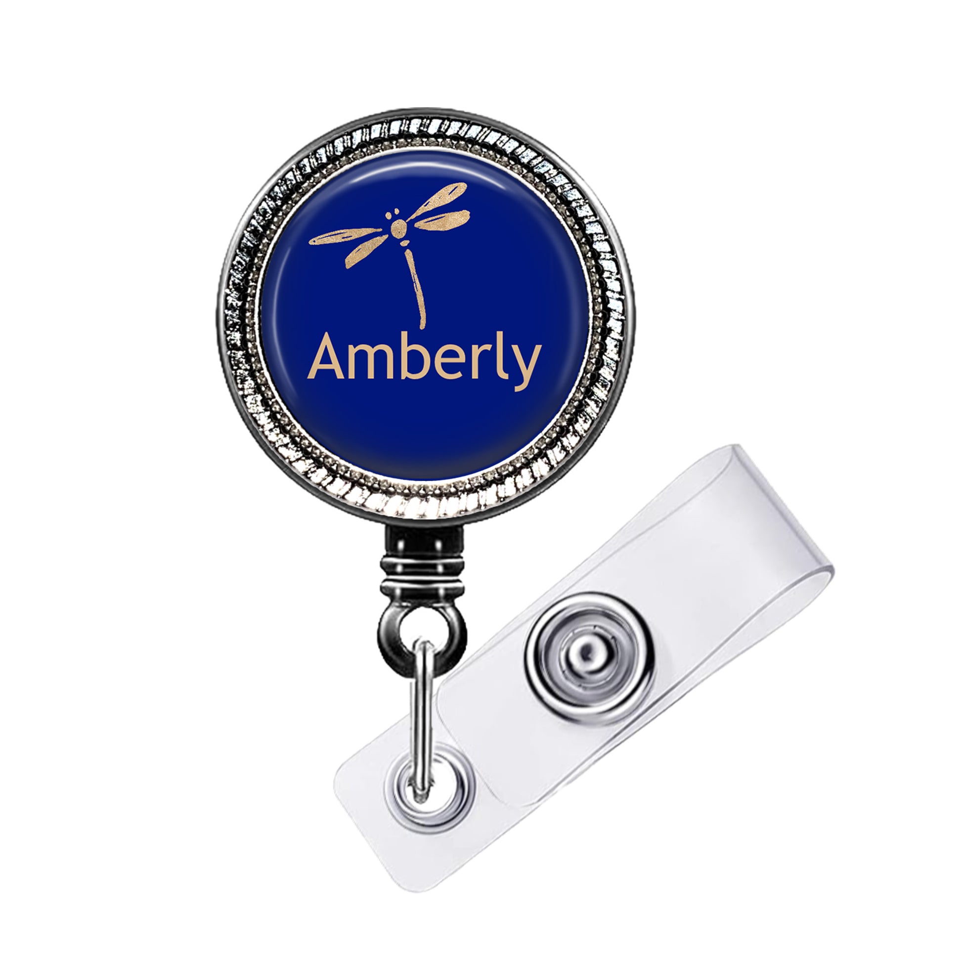 A blue badge with a dragonfly design and the name "Amberly" printed on it.