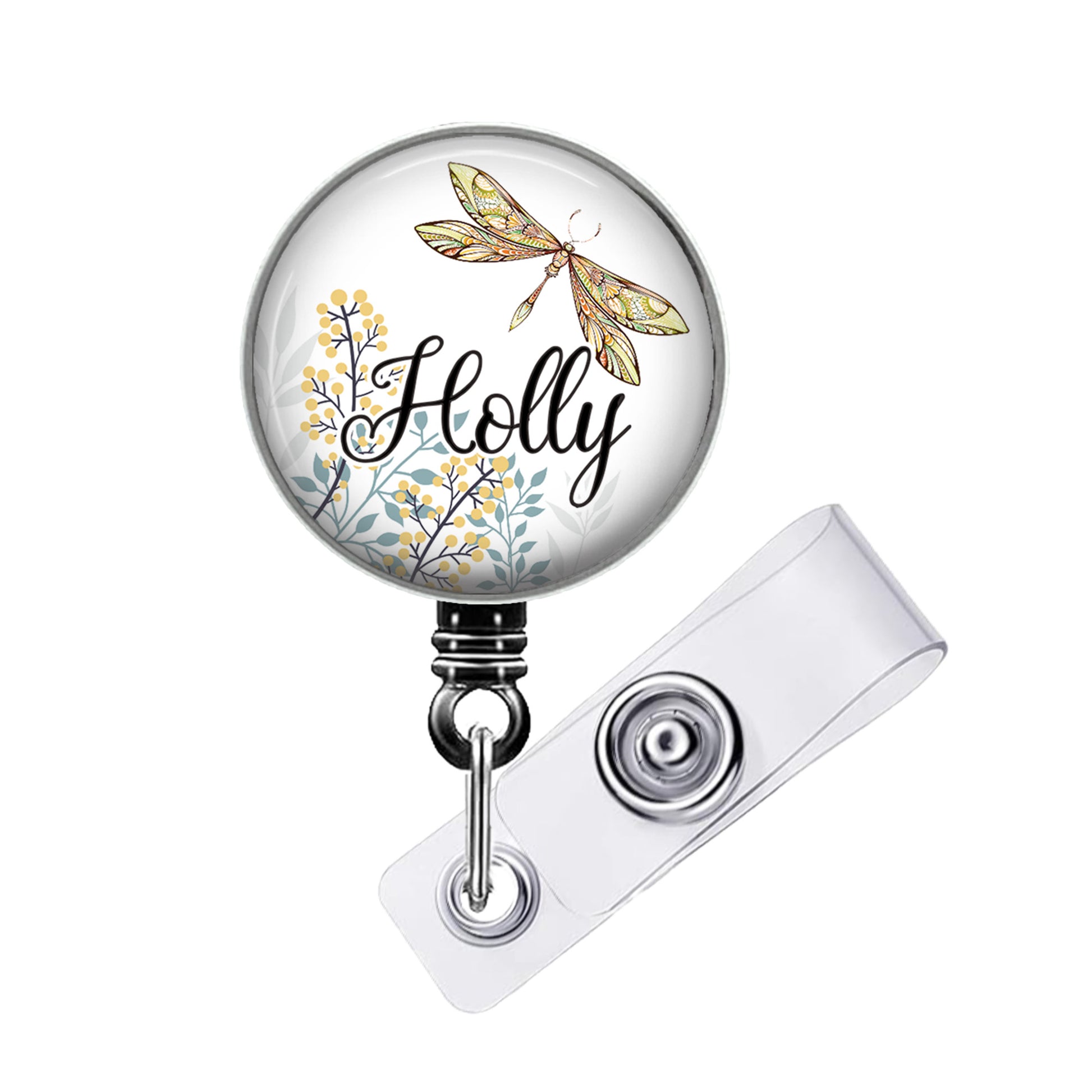 A round badge holder with a dragonfly design and the word "Holly" written on it.