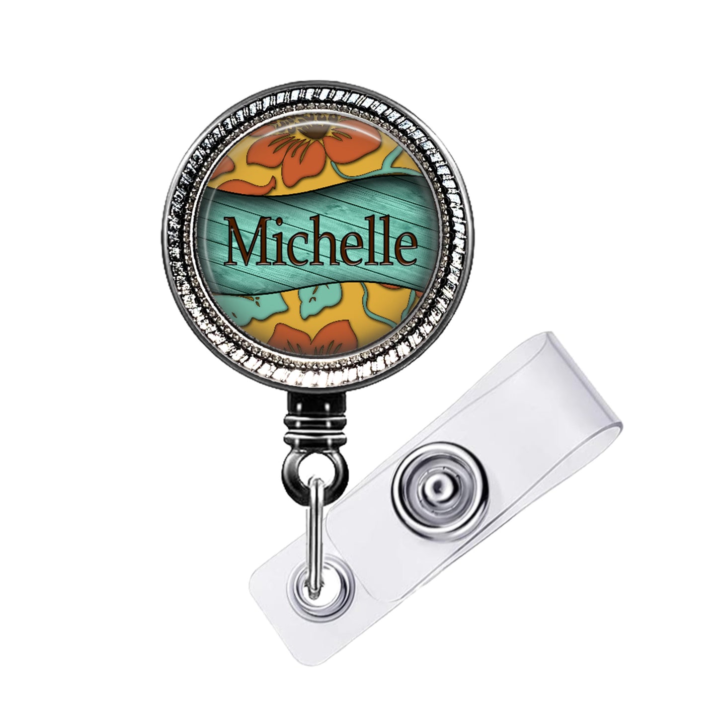 A round badge holder with a floral design and the name "Michelle" printed on it.