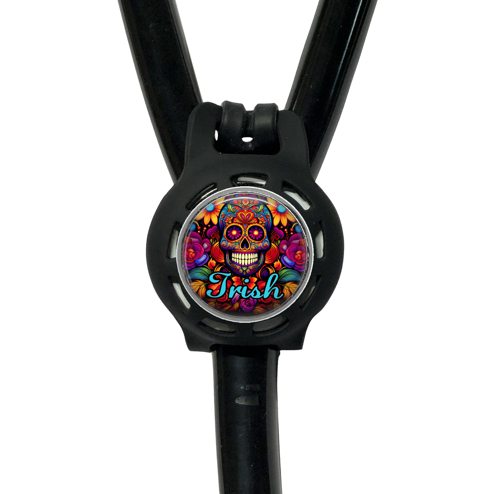 A black stethoscope with a colorful, circular charm featuring a skull design and the word "Irish" written on it.