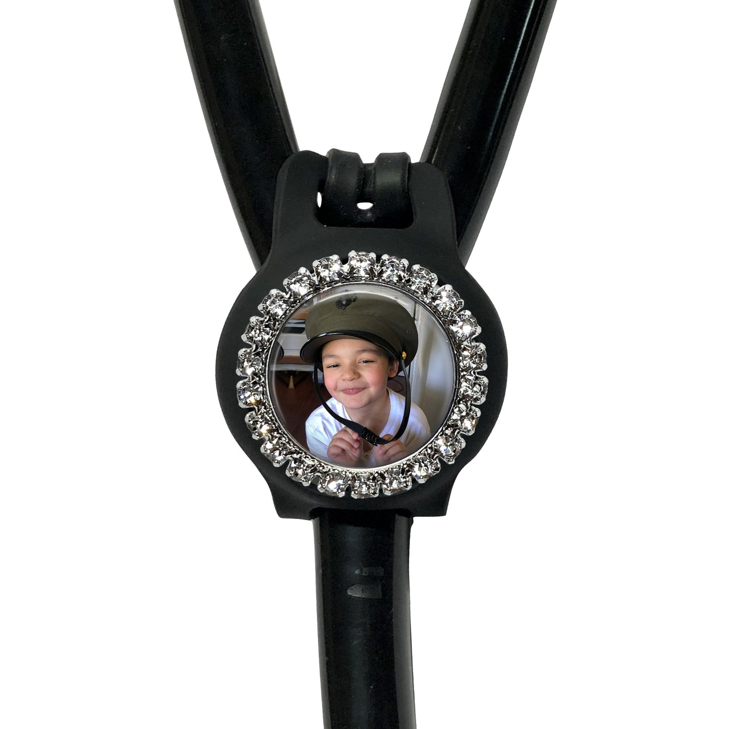 A black stethoscope with a personalized photo of a smiling young boy on the front.