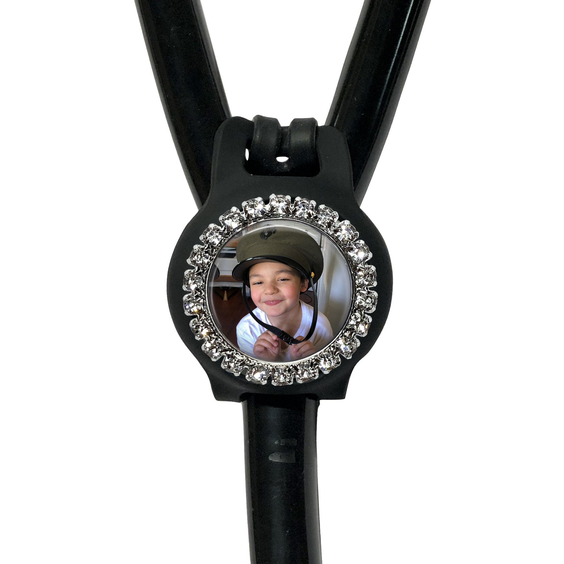 A black stethoscope with a personalized photo of a smiling young boy on the front.