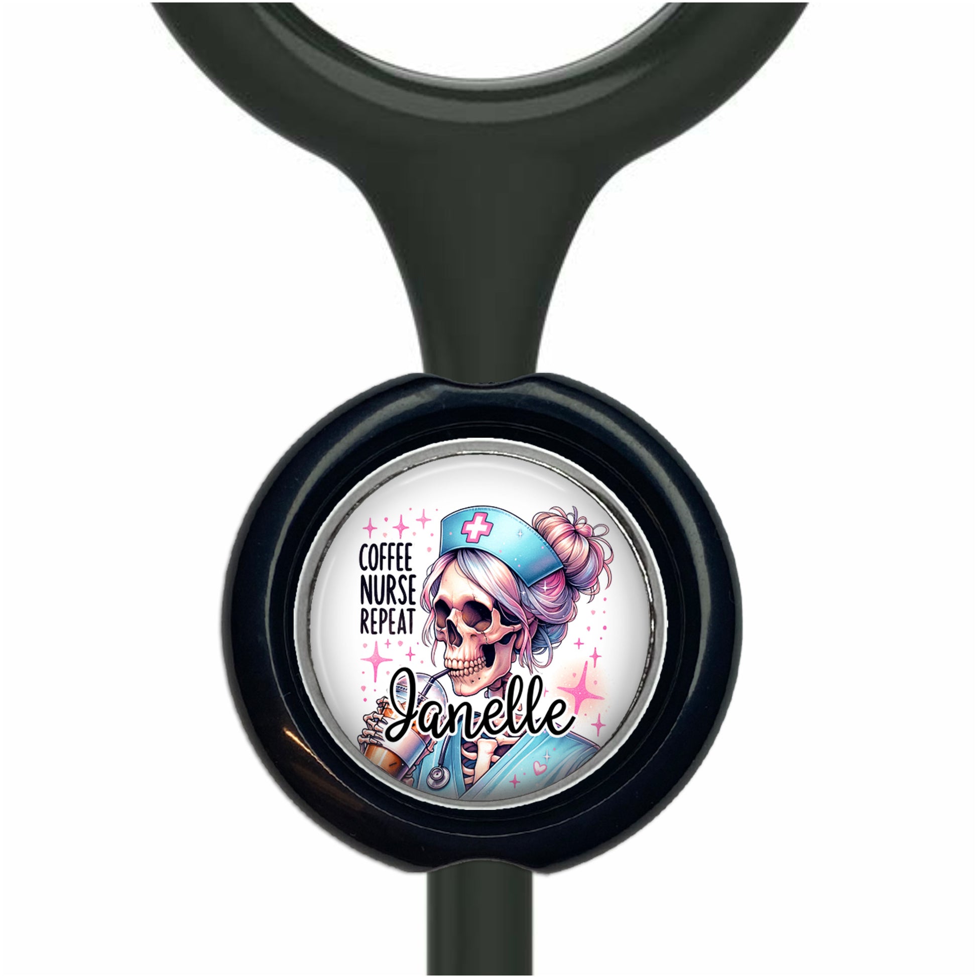 A black stethoscope with a round, personalized nameplate attached to it. The nameplate features a cartoon image of a skeleton wearing a nurse's hat and the text "Coffee Nurse Repeat".