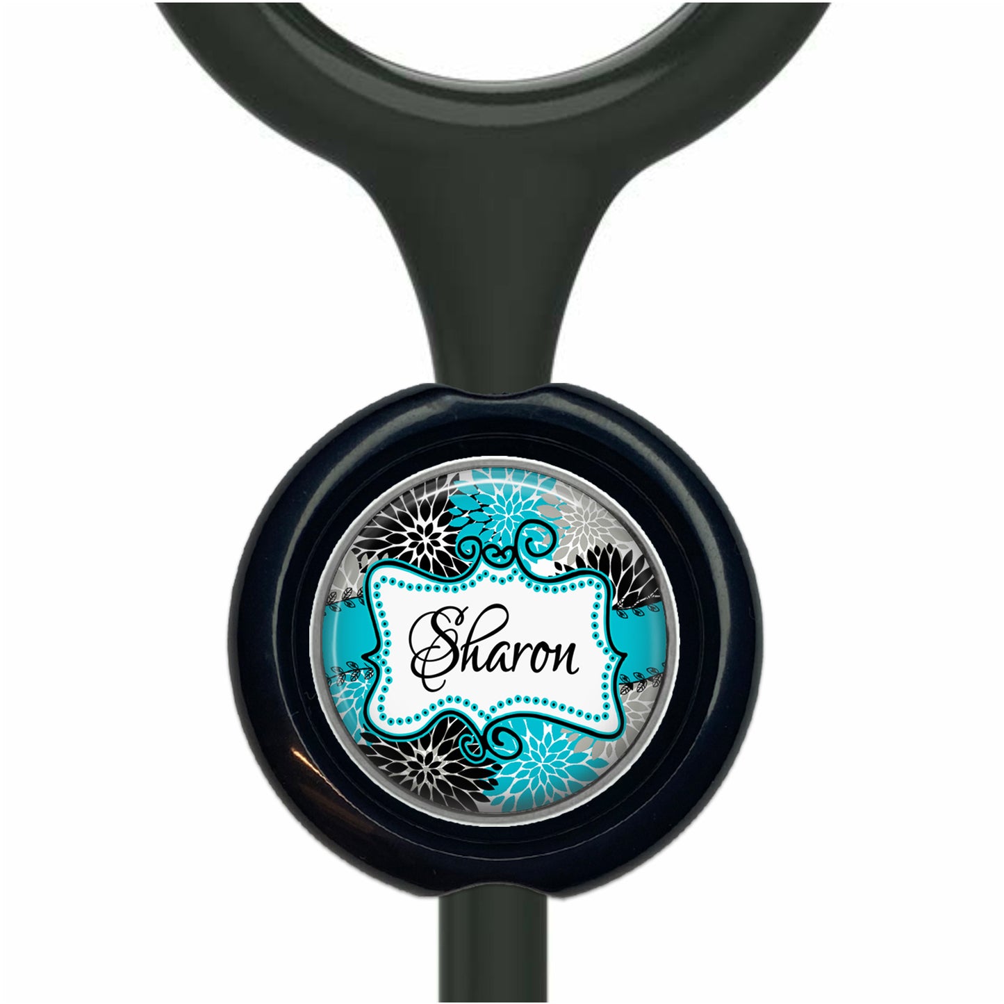 A black stethoscope with a round, personalized nameplate attached to it.