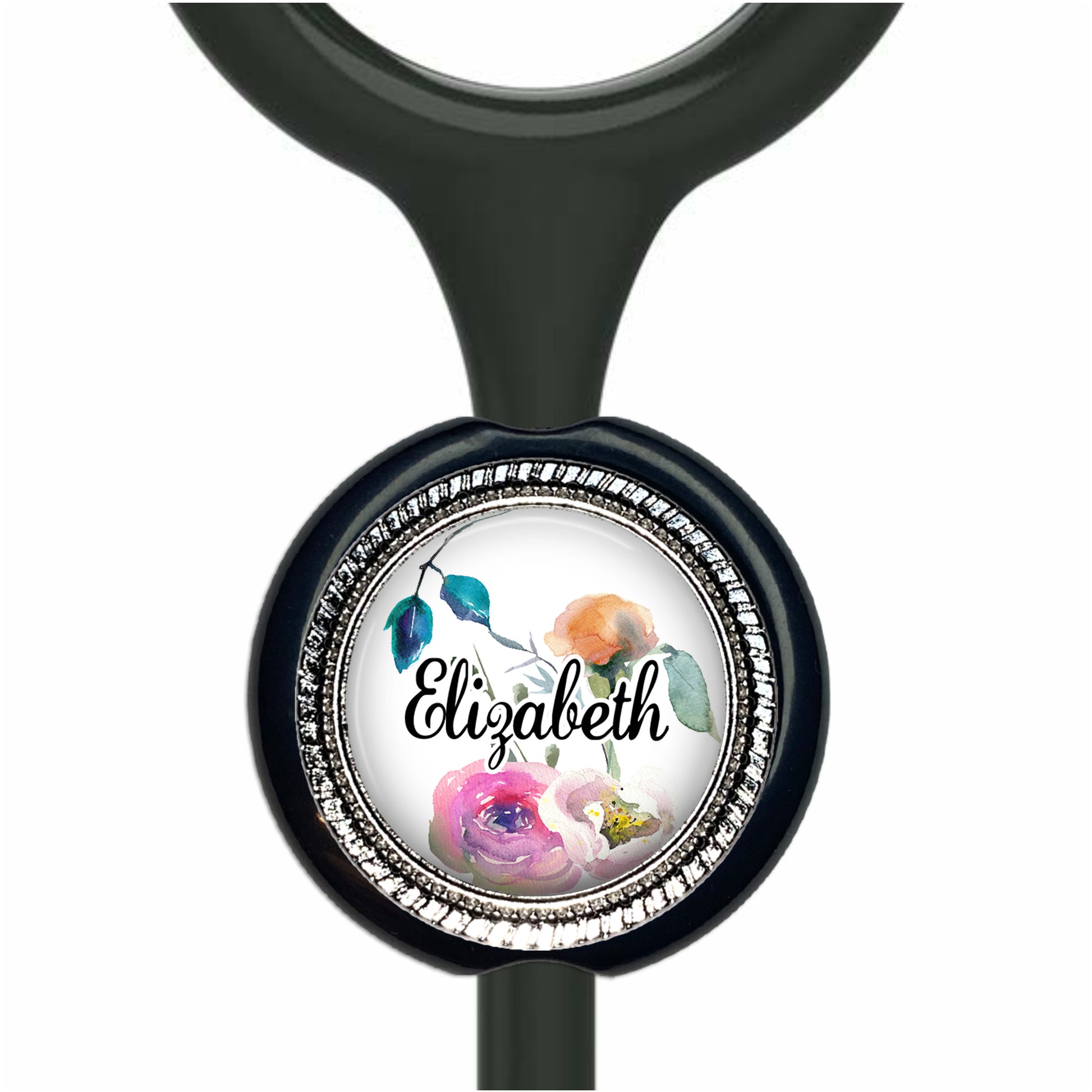 A black stethoscope with a round, decorative charm featuring a floral design and the name "Eliza" written on it.
