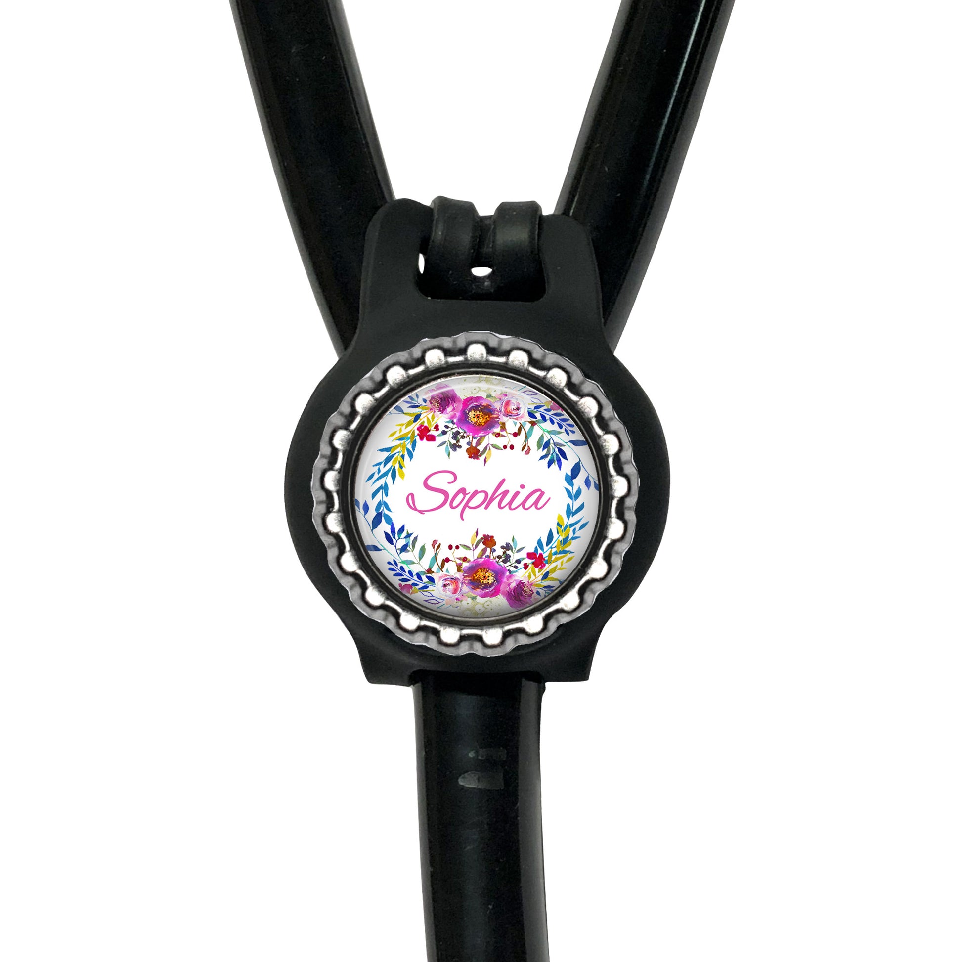 A black stethoscope with a personalized nameplate attached to it.