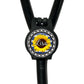 A black stethoscope with a personalized name badge attached to it.