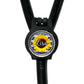 A black stethoscope with a personalized name badge attached to it.