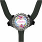 A personalized nameplate with a floral design, attached to a stethoscope.