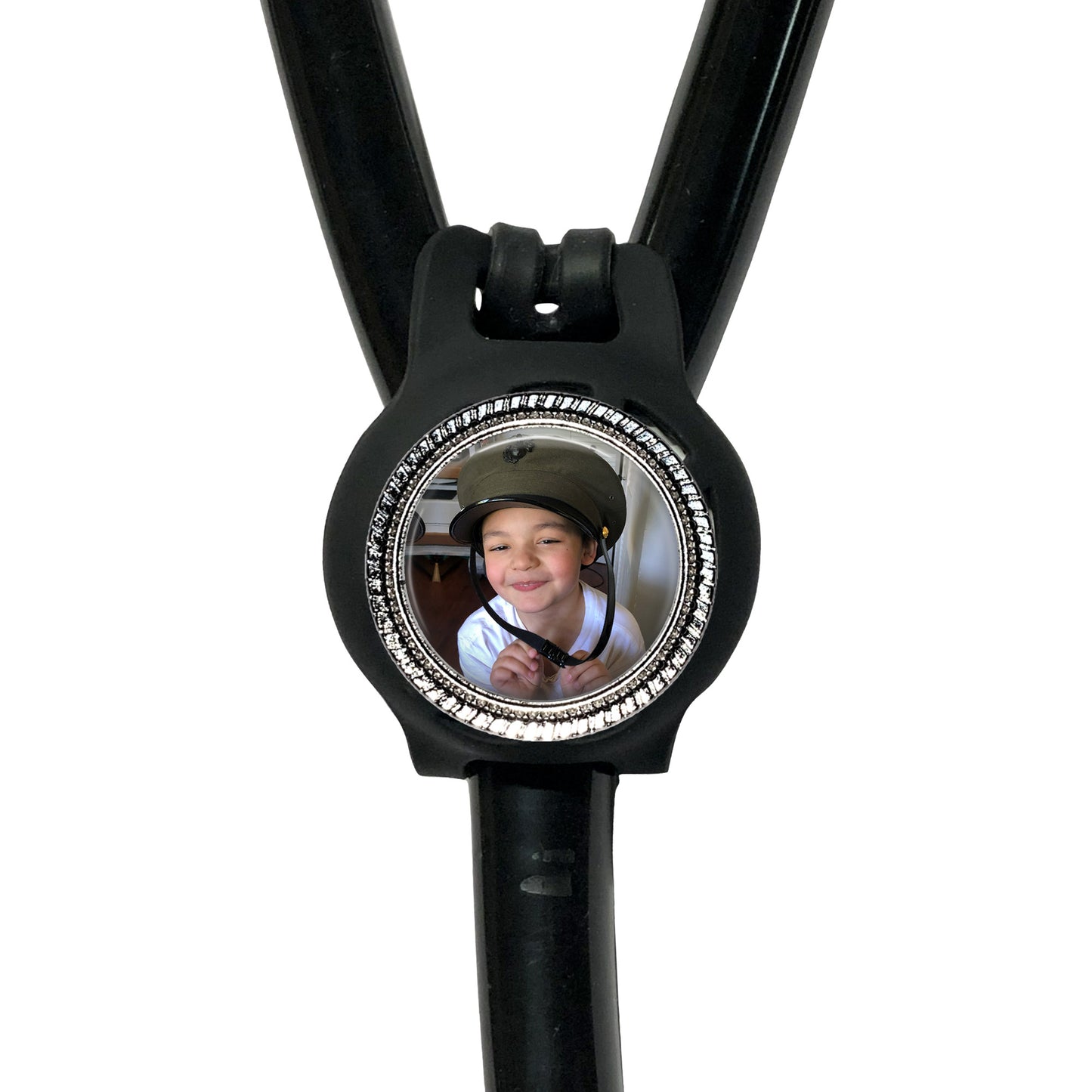 A black stethoscope with a circular frame containing a photo of a smiling person.