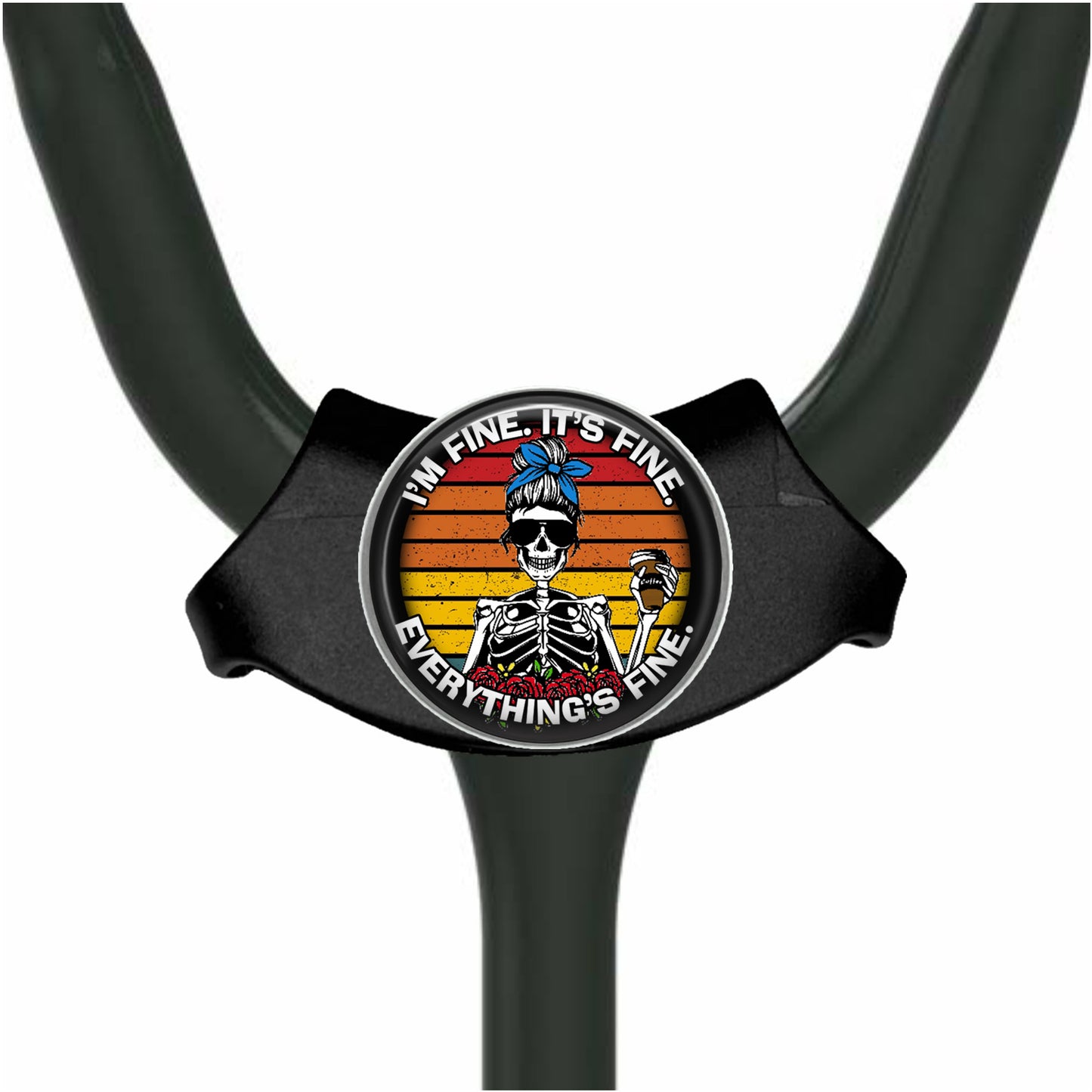 A black stethoscope with a circular badge featuring a skeleton wearing sunglasses and holding a sign that says "I'm fine, it's fine, everything's fine."