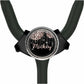 A black stethoscope with a personalized name badge on it.