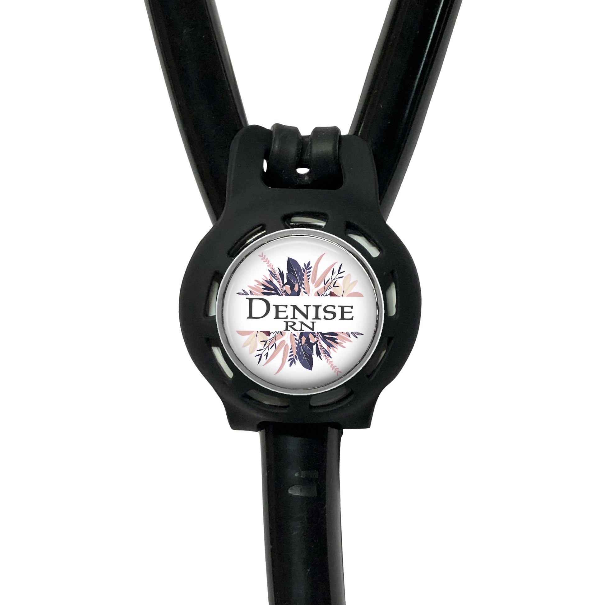 A black stethoscope with a round decal on it, displaying the word "Denise RN".