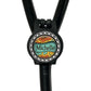 A black stethoscope with a personalized name tag attached to it.