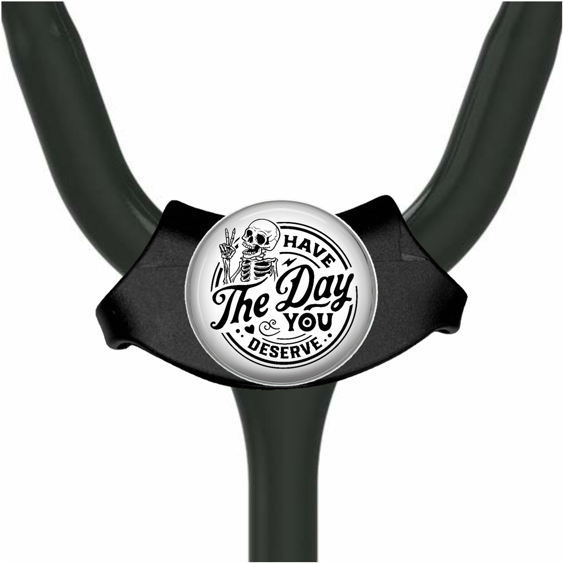 A black and white medical device with a circular badge featuring a skull and the text "HAVE THE DAY YOU DESERVE".