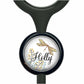 A black stethoscope with a round, black and white design featuring a yellow and green dragonfly and the name "Holly" written on it.