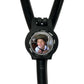 A black stethoscope with a circular mirror attached to it, displaying a smiling young boy wearing a helmet.