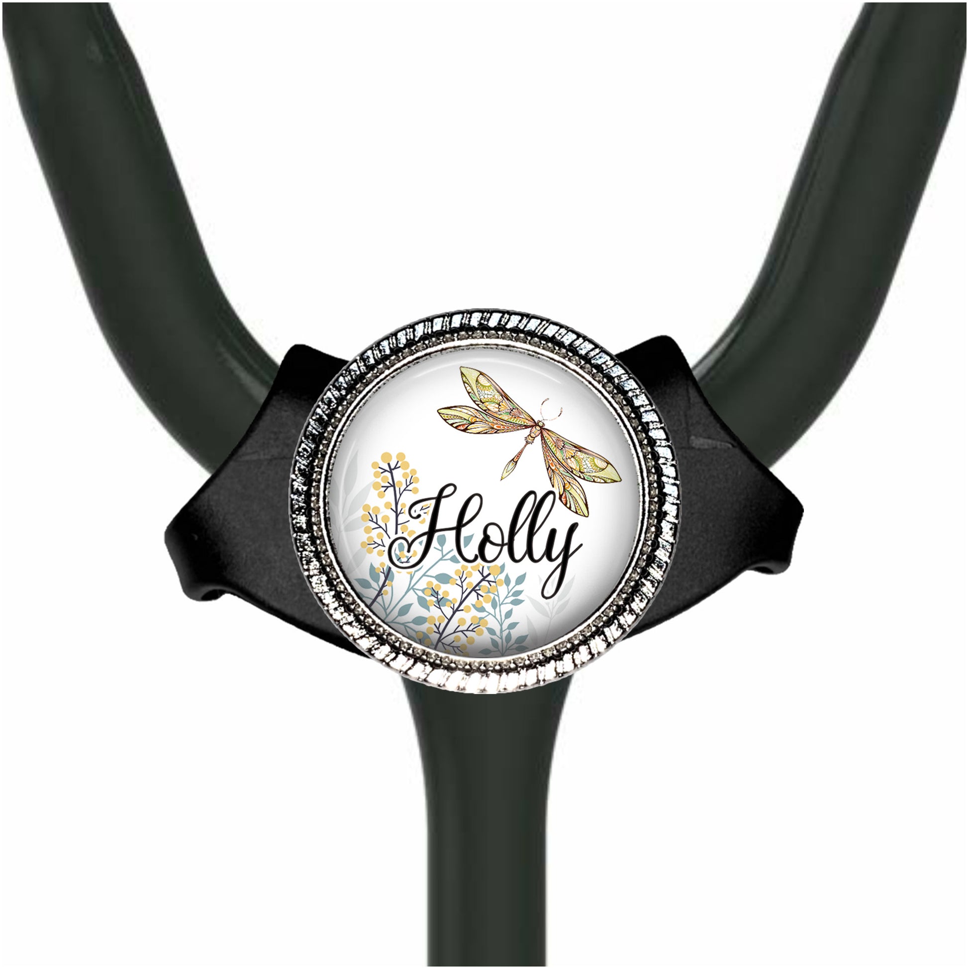 A black stethoscope with a round, decorative charm featuring a dragonfly and the word "Holly" on it.