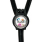 A black stethoscope with a personalized name badge attached to it.