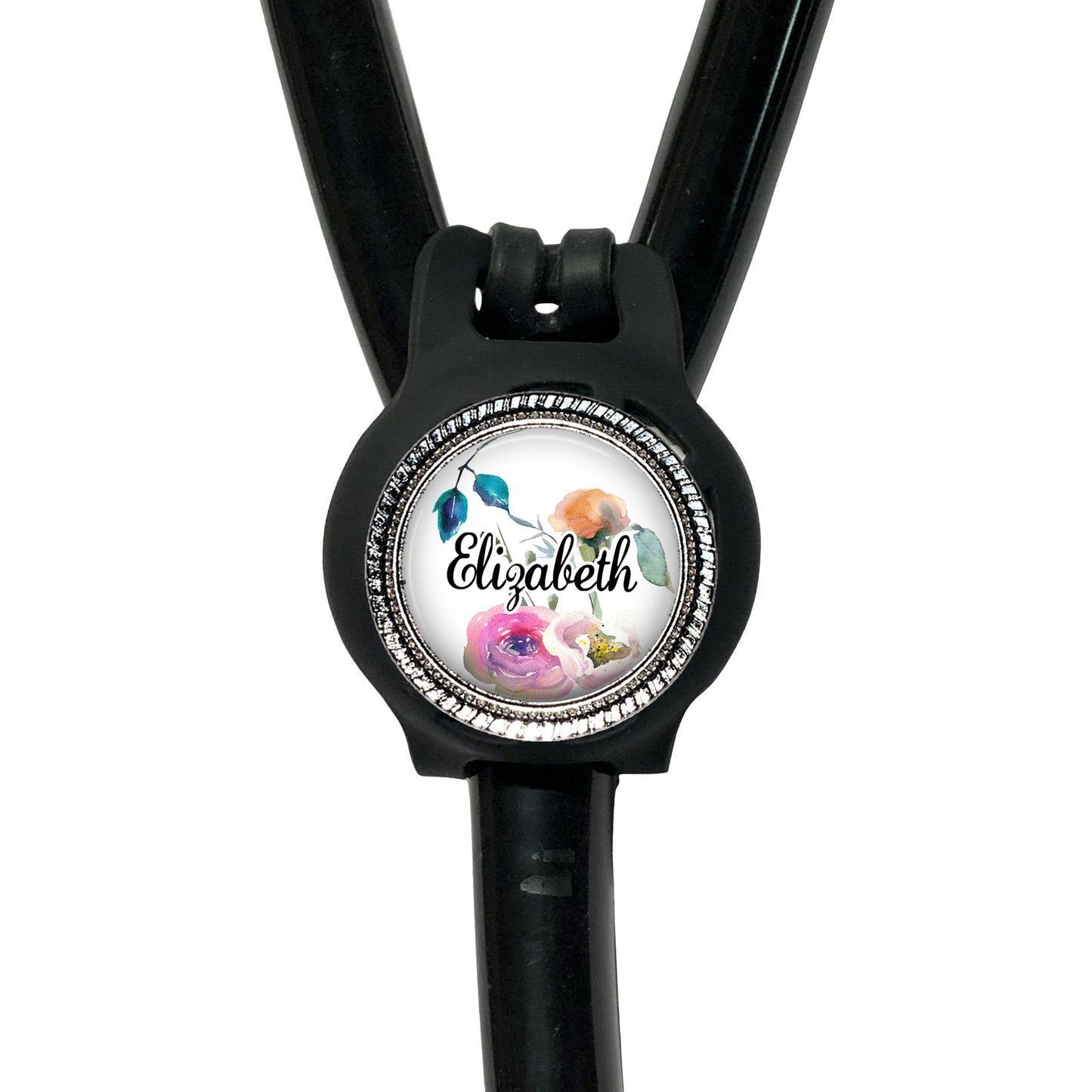 A black stethoscope with a personalized name badge attached to it.