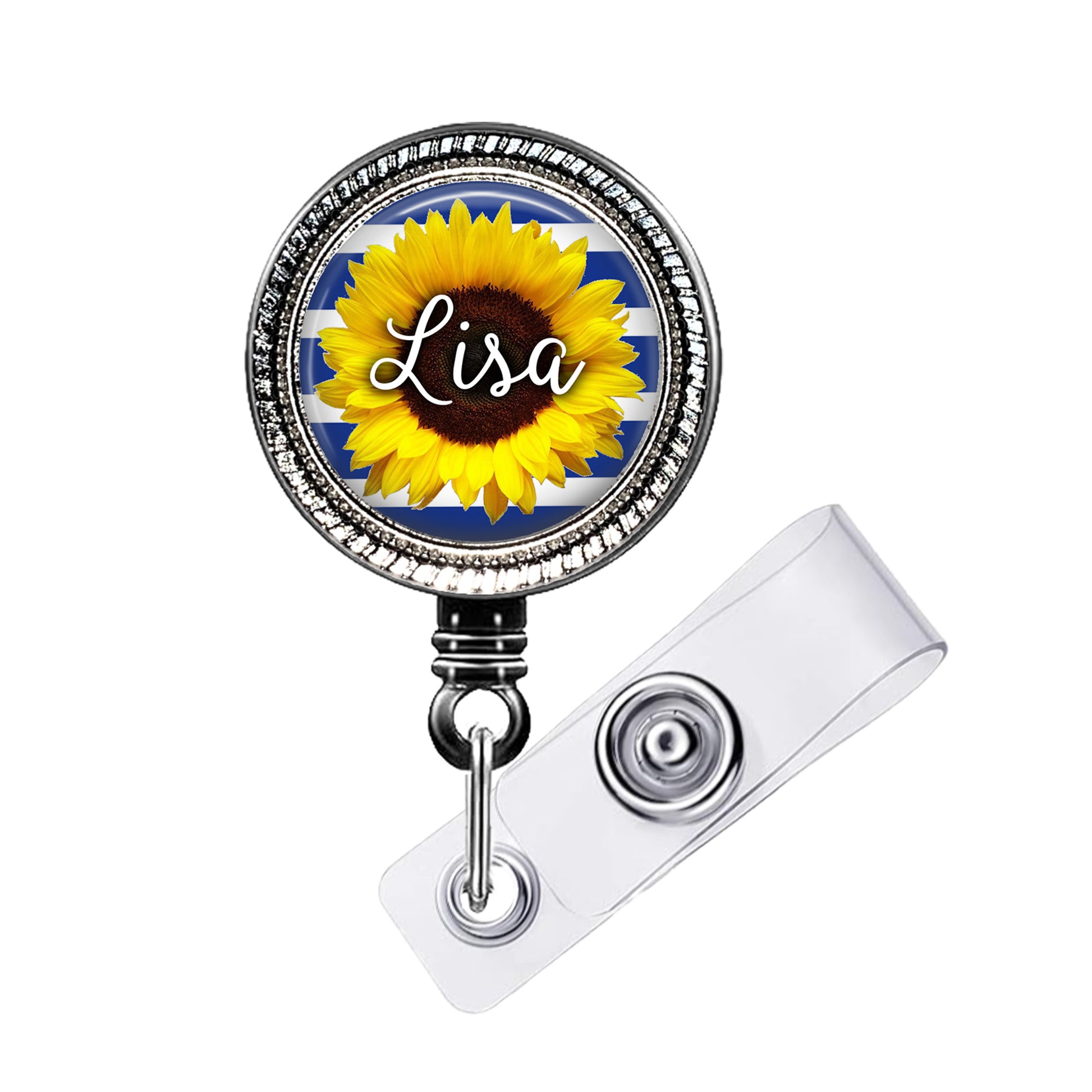 A round badge holder with a sunflower design and the name "Lisa" written on it.