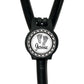 A black stethoscope with a personalized name badge attached to it.