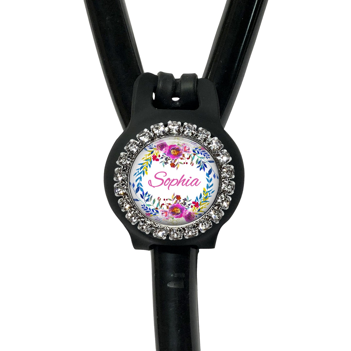 A black stethoscope with a personalized name badge attached to it.