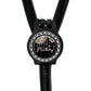 A black stethoscope with a round, personalized name tag attached to it.