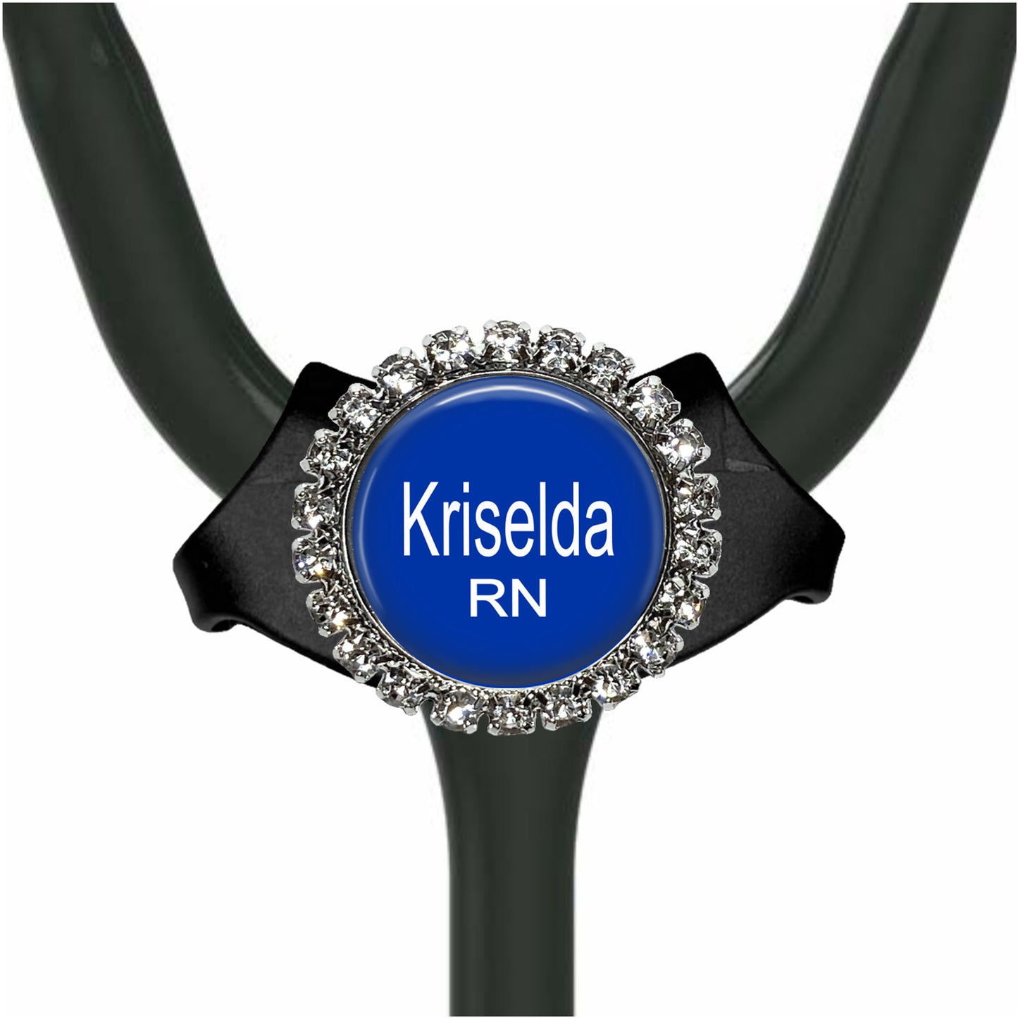 A stethoscope with a blue badge that says "Krisela RN" on it.