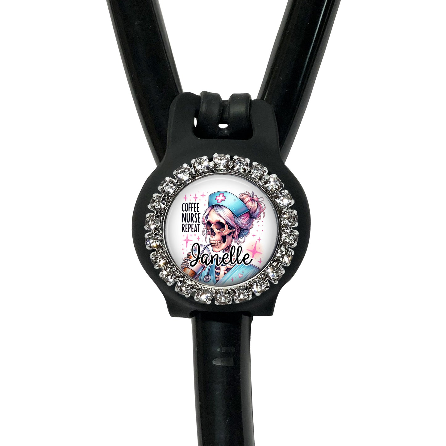 A black stethoscope with a decorative charm featuring a skull wearing a blue hat and the text "Coffee nurse prep" around it.