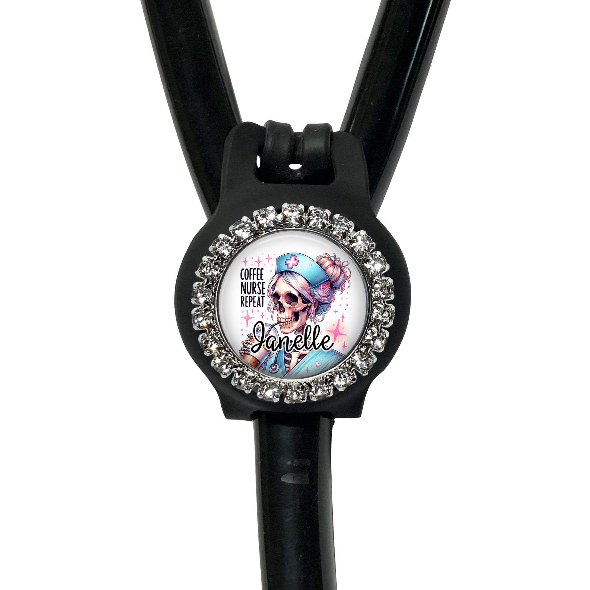 A black stethoscope with a decorative charm featuring a skull wearing a blue hat and the text "Coffee nurse prep" around it.